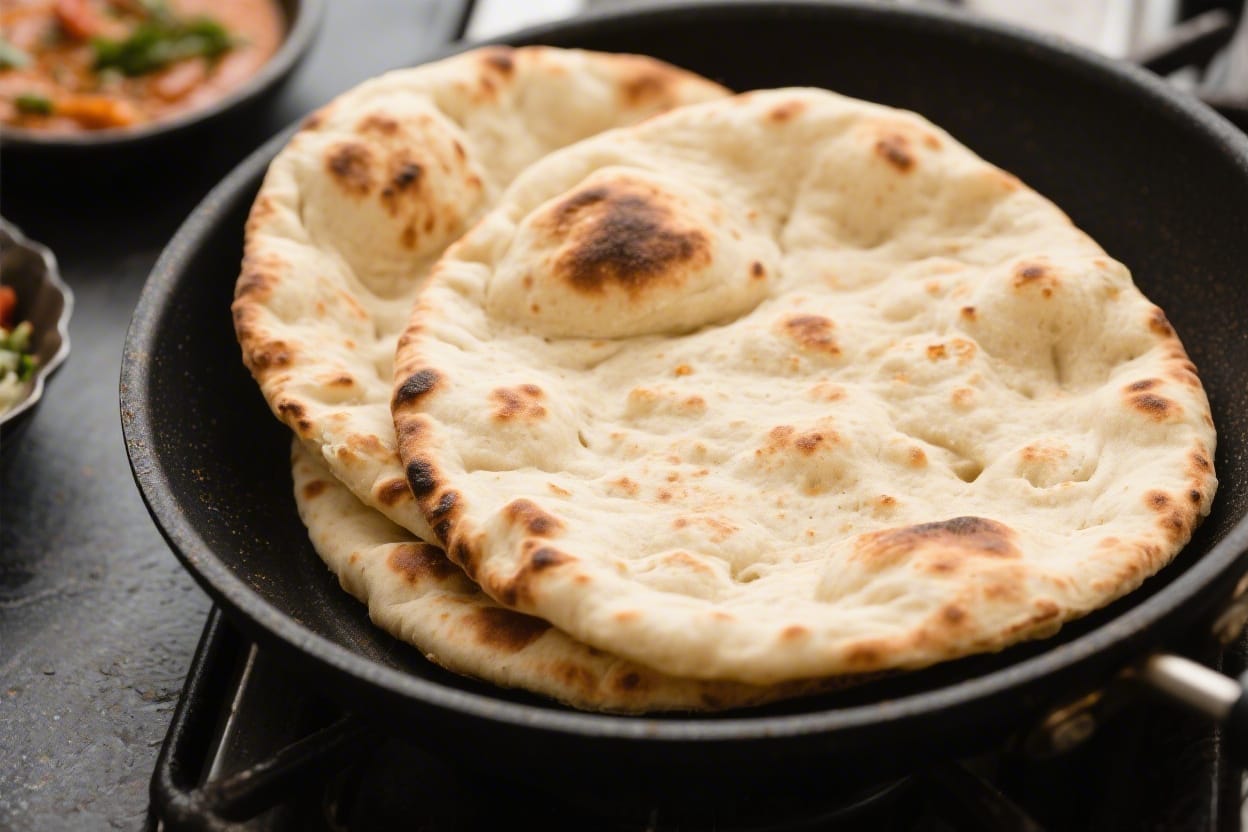 Easy stovetop naan bread recipe - This easy stovetop naan bread recipe gives you soft, chewy flatbreads with blistered edges in about